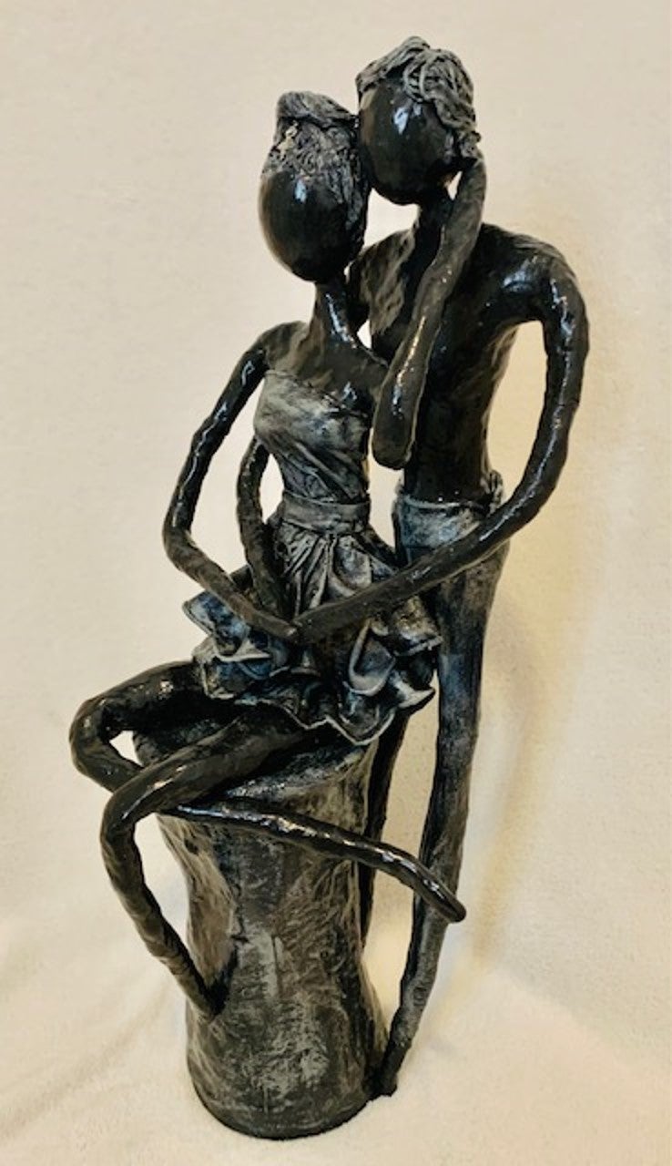 Expressive black couple sculpture created by Lorraine Delangis
